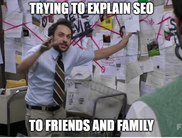 A man trying to explain SEO with connections and boards.